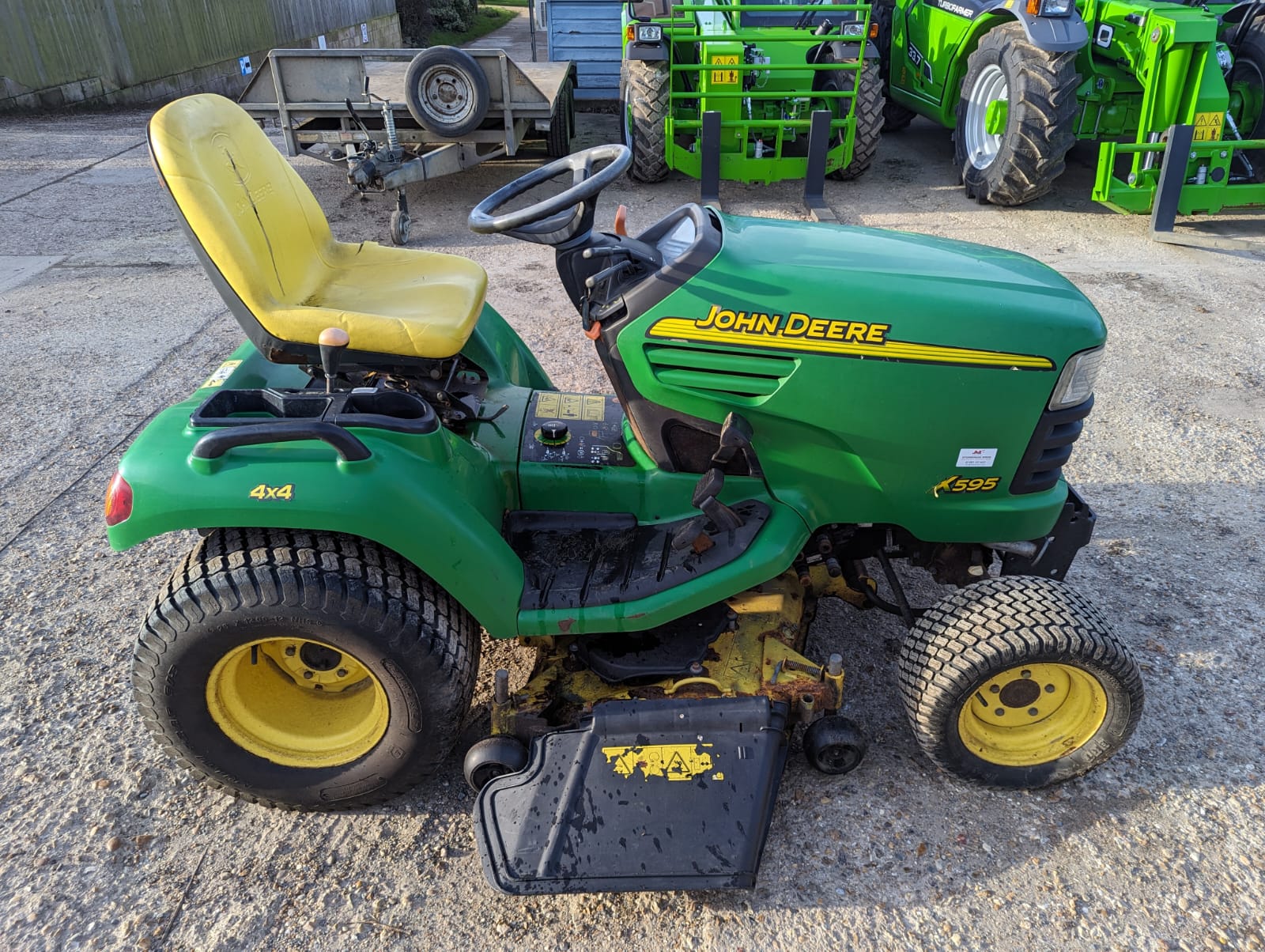 used-john-deere-x595-ride-on-diesel-mower